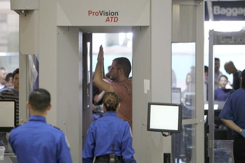 Homeland Security Chief Jeh Johnson Tours TSA Security Operation At LAX