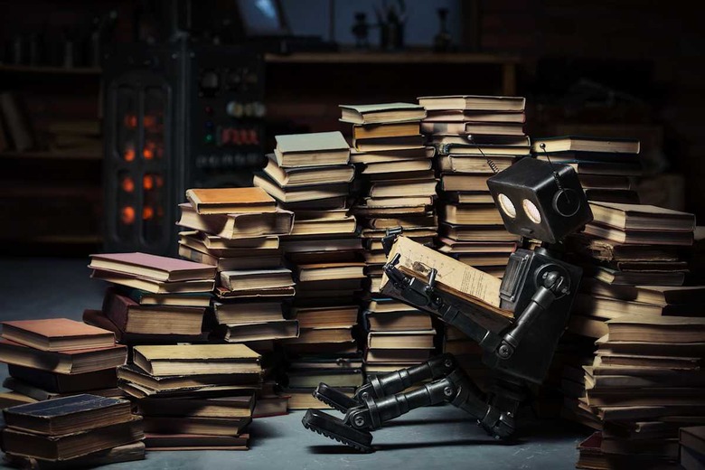 robot child reading a book in...
