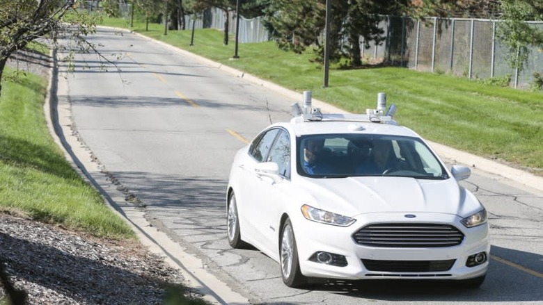 Fordâs fully autonomous Fusion Hybrid research vehicle on the streets of Dearborn, Mich. Ford has been researching autonomous vehicles for more than a decade and currently tests fully autonomous vehicles in Michigan, Arizona and California. Ford recently announced its intent to have a high-volume, fully autonomous SAE level 4-capable vehicle in commercial operation in 2021 in a ride-hailing or ride-sharing service.