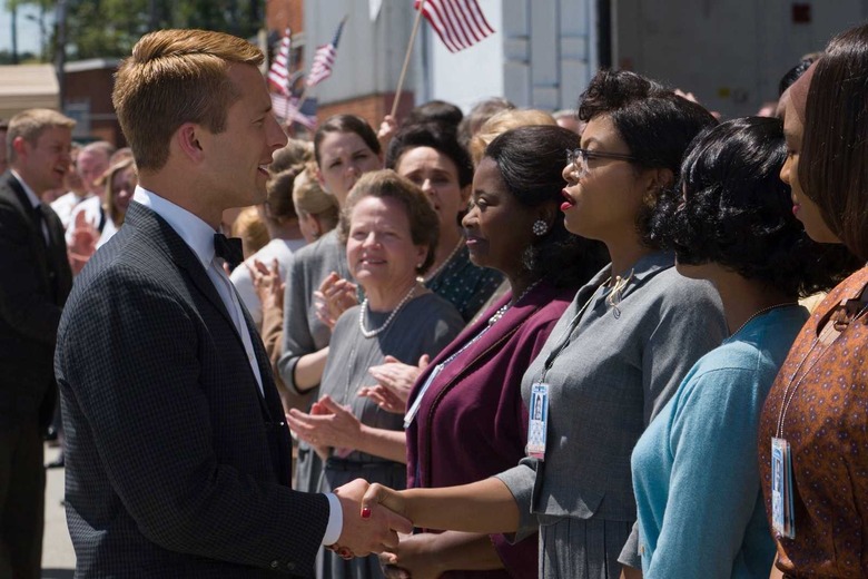 DF-04856_R2 - Katherine G. Johnson (Taraji P. Henson), flanked by fellow mathematicians Dorothy Vaughan (Octavia Spencer) and Mary Jackson (Janelle Monáe) meet the man they helped send into orbit, John Glenn (Glen Powell), in HIDDEN FIGURES. Photo Credit: Hopper Stone.