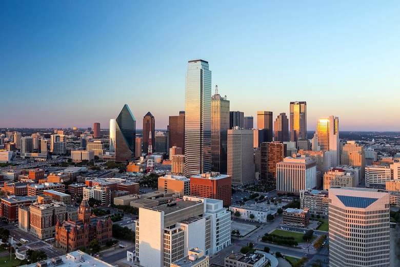 Dallas, Texas cityscape with blue sky at sunset, Texas