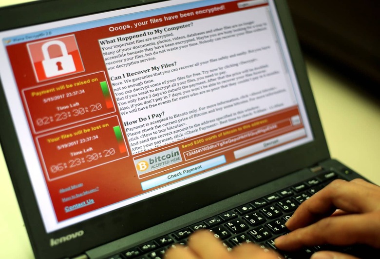 RIT01. Taipei (Taiwan), 12/05/2017.- A programer shows a sample of a ransomware cyberattack on a laptop in Taipei, Taiwan, 13 May, 2017. According to news reports, a 'WannaCry' ransomware cyber attack hits thousands of computers in 99 countries encrypting files from affected computer units and demanding 300 US dollars through bitcoin to decrypt the files. (Atentado, Estados Unidos) EFE/EPA/RITCHIE B. TONGO