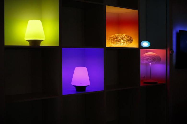 Philips hue personal wireless lights, manufactured by Royal Philips NV, sit illuminated during the company's annual general meeting in Amsterdam, Netherlands, on Thursday, May 1, 2014. Philips is focusing on higher-margin areas such as lighting products that save energy, and health and wellness offerings, to move away from its consumer-electronics past amid competition from Asian rivals such as Samsung Electronics Co. and Sony Corp. Photographer: Jasper Juinen/Bloomberg via Getty Images