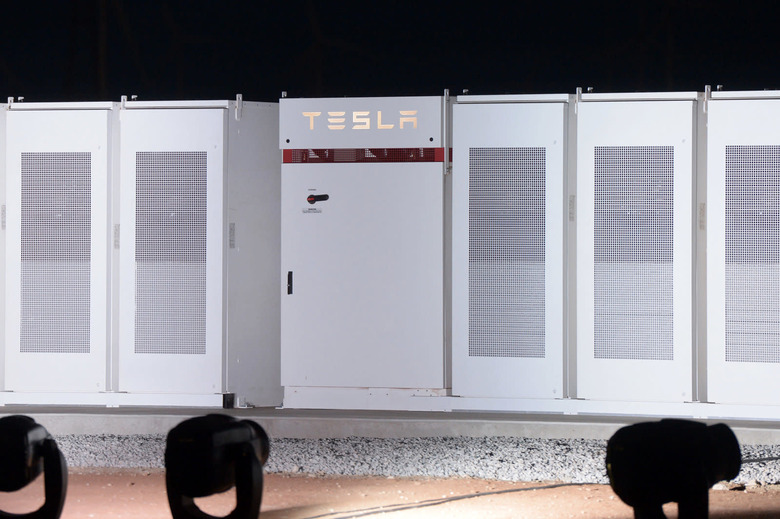 TeslaÂ Inc. Powerpacks that will be used to form theÂ world's largestÂ lithium-ionÂ battery stand on display at the Hornsdale wind farm, operated by Neoen SAS, near Jamestown, South Australia, on Friday, Sept. 29, 2017. Tesla Chief Executive Officer Elon Musk descended on South Australia on Friday to unveil progress on a giant battery seen critical to averting crippling powerÂ shortages in the state. Photographer: Carla Gottgens/Bloomberg via Getty Images