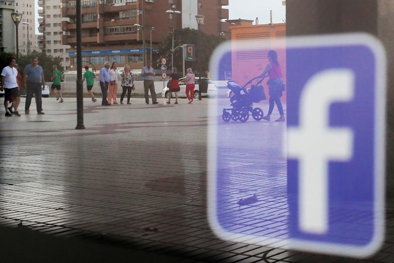 Facebook logo is seen on a shop window in Malaga, Spain, June 4, 2018. REUTERS/Jon Nazca