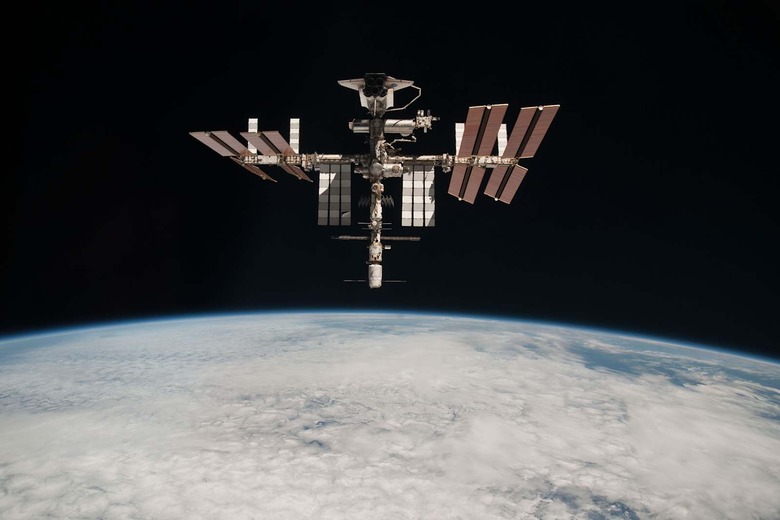 Endeavour Orbits Earth Docked To International Space Station