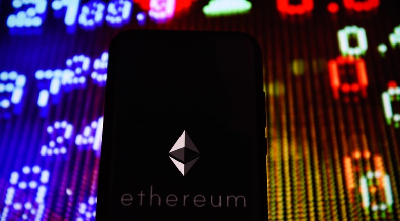 Crypto currency Ethereum logo is seen on an android mobile