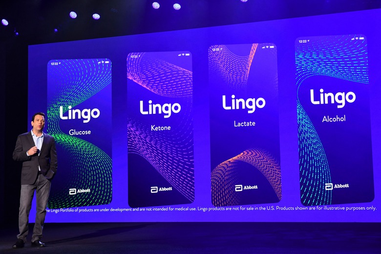 Robert Ford, chairman and chief executive officer of Abbott Laboratories, unveils a portfolio of Lingo biosensors for health monitoring during the company's keynote at the Consumer Electronics Show (CES) on January 6, 2022 in Las Vegas, Nevada. (Photo by Patrick T. FALLON / AFP) (Photo by PATRICK T. FALLON/AFP via Getty Images)