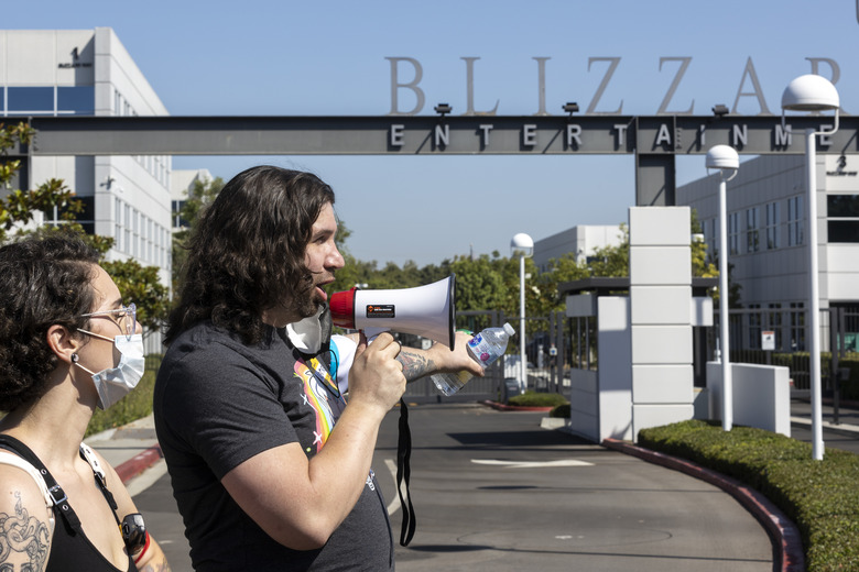 Irvine, CA - July 28: Several hundred Activision Blizzard employees stage a walkout which they say is in a response from company leadership to a lawsuit highlighting alleged harassment, inequality, and more within the company outside the gate at Activision Blizzard headquarters on Wednesday, July 28, 2021 in Irvine, CA. (Allen J. Schaben / Los Angeles Times via Getty Images)