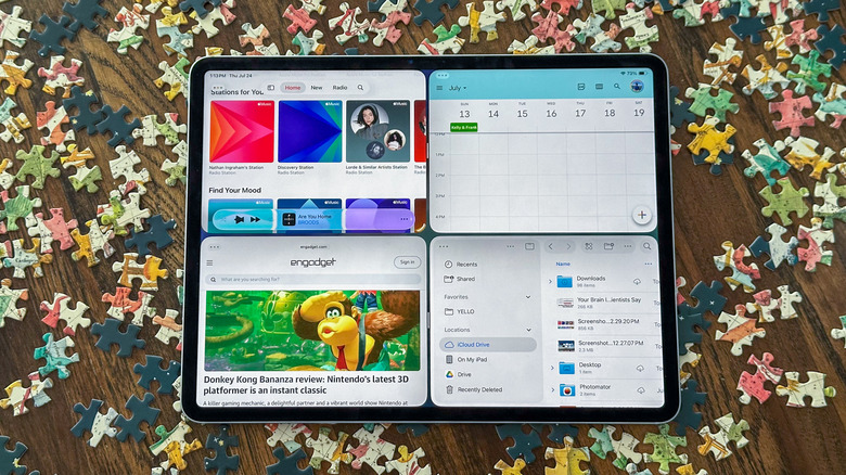 An iPad running multiple windows in iPadOS 26