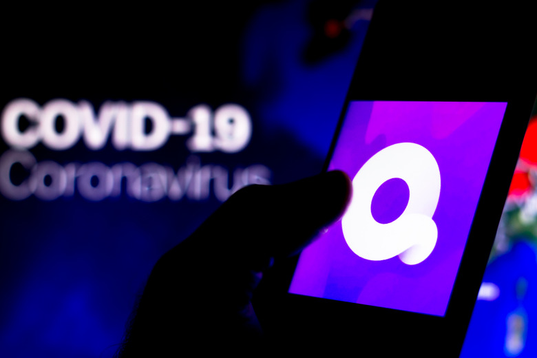 BRAZIL - 2020/04/08: In this photo illustration the Quibi logo seen displayed on a smartphone with a computer model of the COVID-19 coronavirus in the background. (Photo Illustration by Rafael Henrique/SOPA Images/LightRocket via Getty Images)