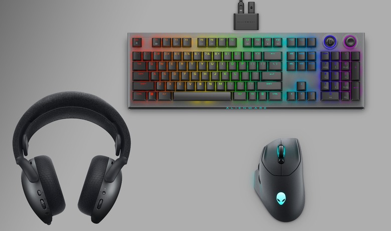 A collage of three Alienware gaming peripherals: an RGB keyboard (top), gaming mouse (lower right) and headset (left).