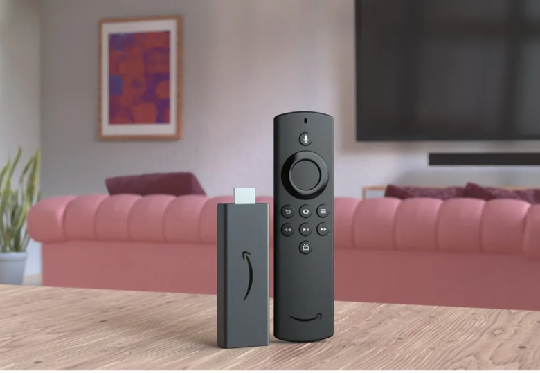 An image of a Fire TV Stick on a table. 