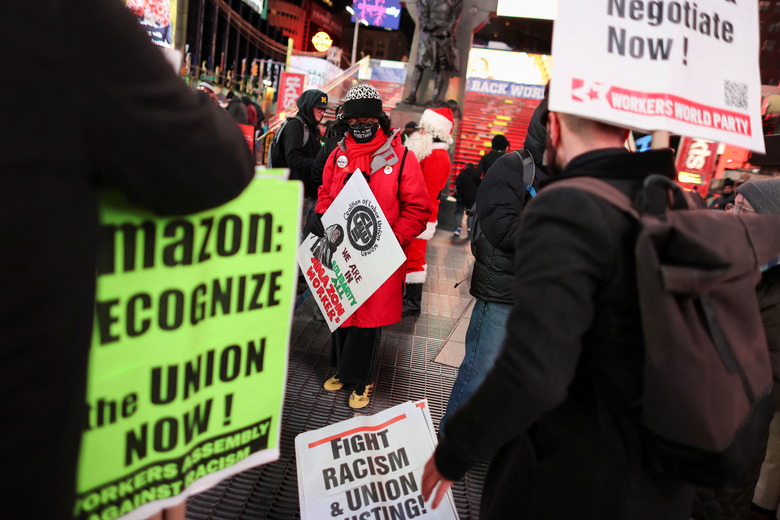 Staten Island Amazon workers protest in Times Square as they demand union rights, in New York City, U.S., December 22, 2021. REUTERS/Ahmed Gaber