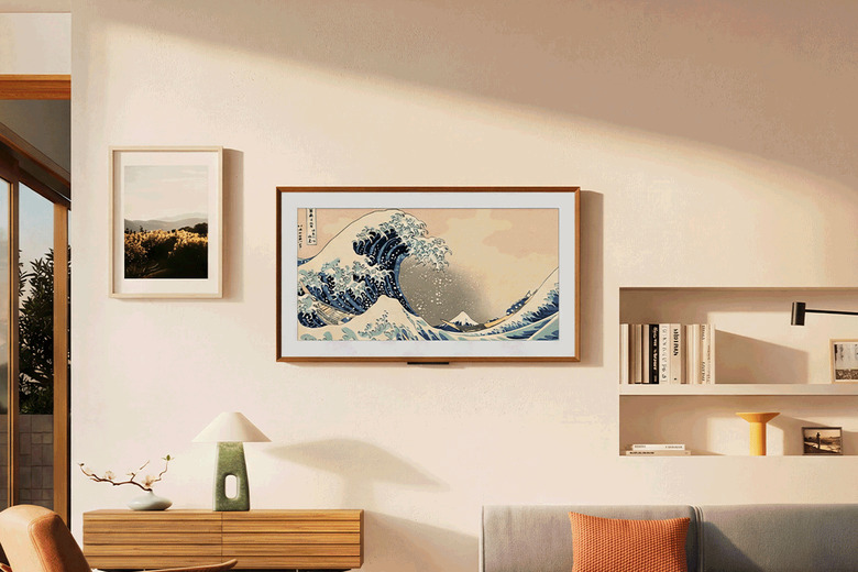 An animated GIF showing the Ember Artline TV in various rooms and settings with varying decor.