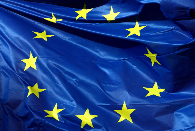 FILE PHOTO: A European Union flag flutters outside the EU Commission headquarters, in Brussels, Belgium, February 1, 2023 REUTERS/Yves Herman/File Photo