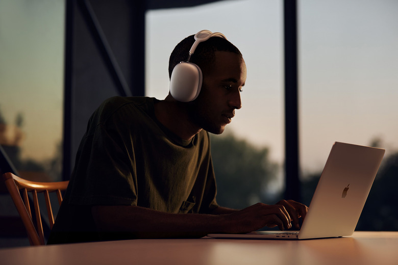Apple AirPods Max headphone in use with a Mac laptop