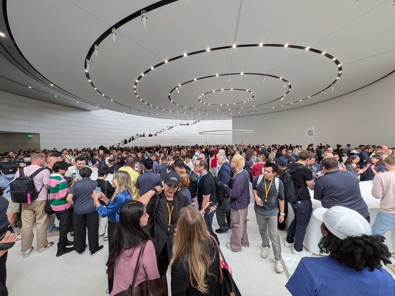 An awful lot of people trying to get their hands on some shiny new products at the iPhone hands-on area at Apple Park.