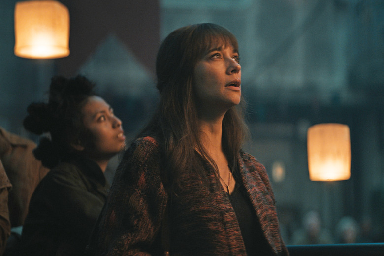 Still from the first episode of ‘Silo,’ a sci-fi series on Apple TV+. Rashida Jones stands aghast, looking at something.