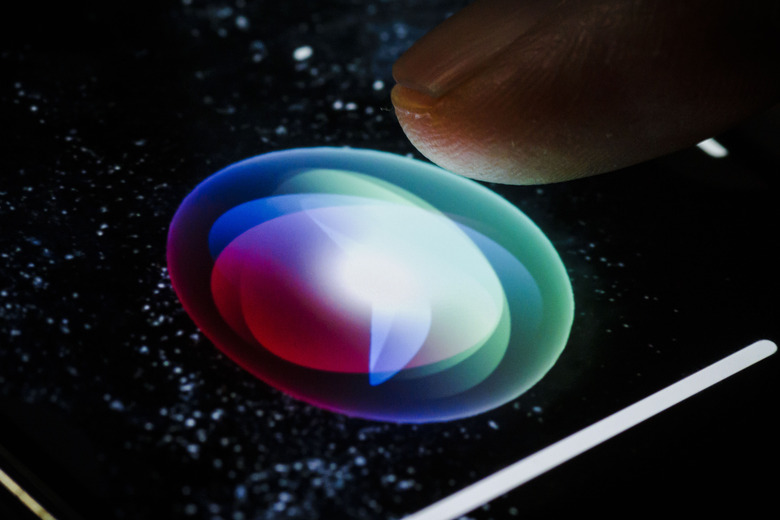 BERLIN, GERMANY - JANUARY 21: In this photo illustration the logo of the speech recognition software Siri (Speech Interpretation and Recognition Interface) is displayed on a smartphone on January 21, 2022 in Berlin, Germany. (Photo Illustration by Thomas Trutschel/Photothek via Getty Images)