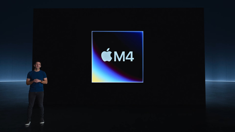 Apple's M4 chip (shown next to VP John Ternus) could help process local Siri requests.