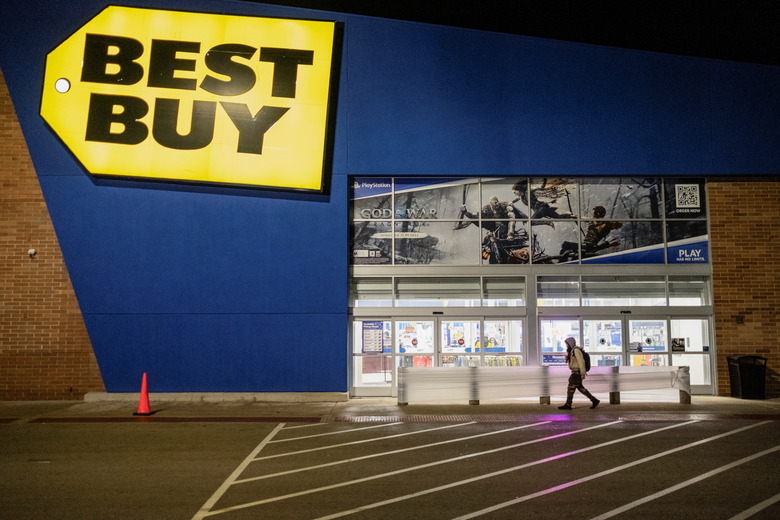 A person walks in front of Best Buy during Black Friday sales in Chicago, Illinois, U.S.,, November 25, 2022. REUTERS/Jim Vondruska