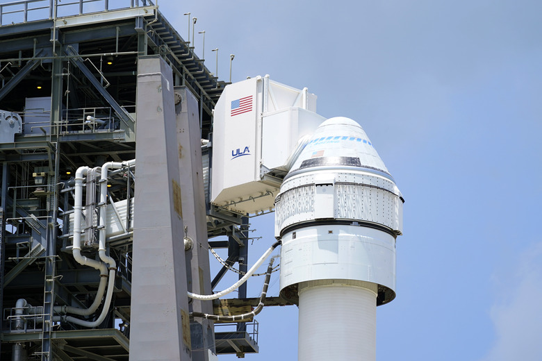 Boeing's CST-100 Starliner attached to an Atlas V rocket.