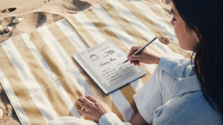 A tablet and a lady.