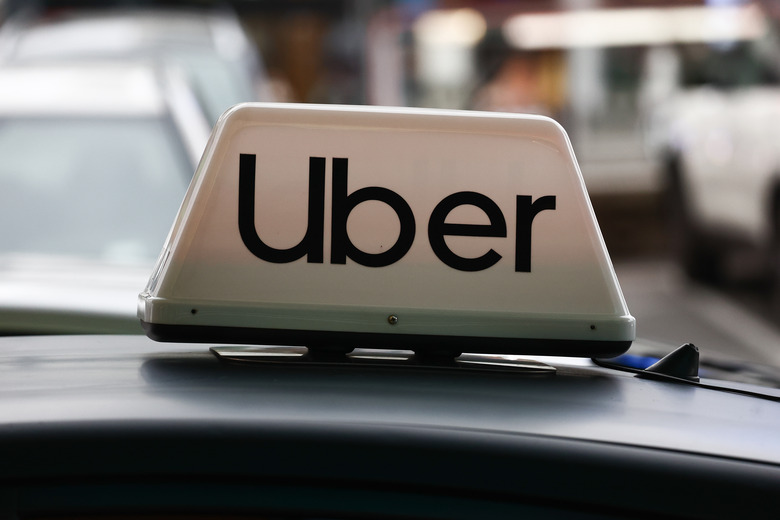 Uber logo is seen in Warsaw, Poland on October 4, 2024. (Photo by Jakub Porzycki/NurPhoto via Getty Images)