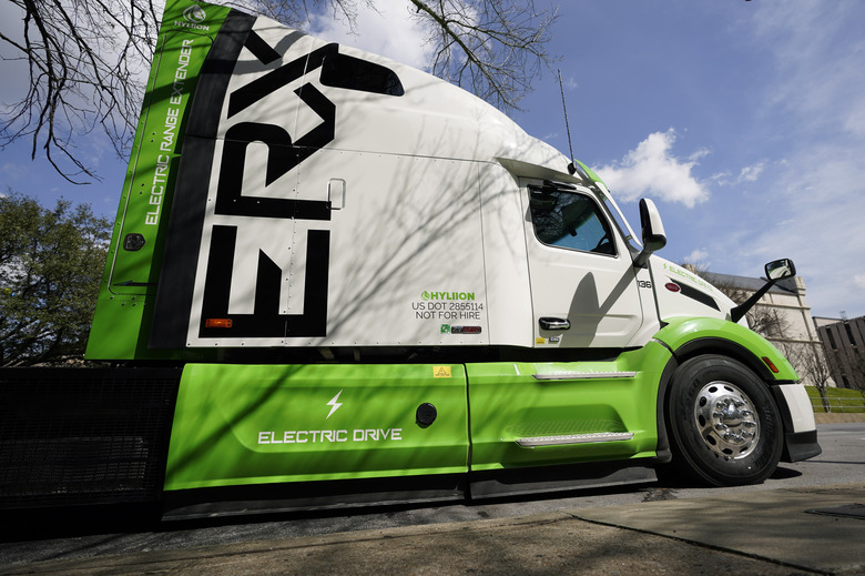 An electric Hyliion tractor trailer is seen on display in Austin, Texas, Wednesday, Feb. 22, 2023. (AP Photo/Eric Gay)