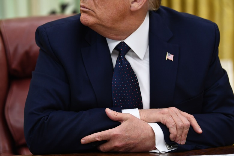 US President Donald Trump waits before signing an executive order on social-media companies in the Oval Office of the White House on May, 28, 2020. (Photo by Brendan Smialowski / AFP) (Photo by BRENDAN SMIALOWSKI/AFP via Getty Images)