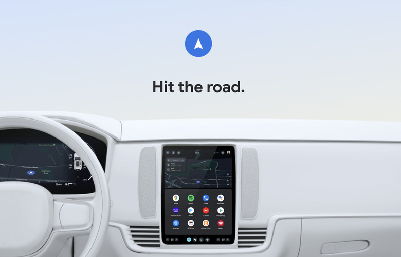A computer render of a car with an entertainment console showing Google apps.