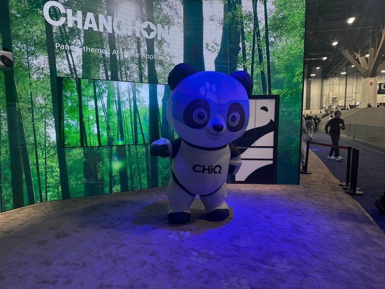 A large humanoid panda at a CES 2026 booth.