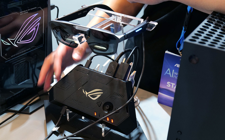 The dock allows you to plug in any standard video source to use the glasses as a monitor.