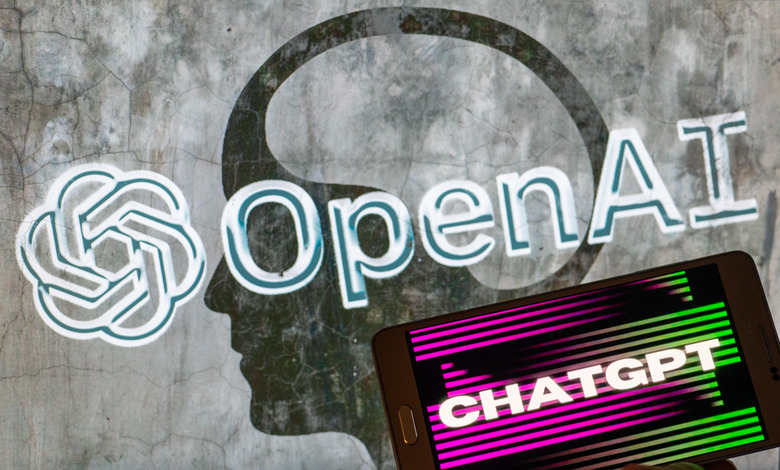 OpenAI logo seen on screen with ChatGPT website displayed on mobile seen in this illustration in Brussels, Belgium, on December 12, 2022.   (Photo by Jonathan Raa/NurPhoto via Getty Images)