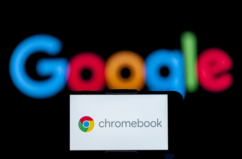 INDIA - 2023/02/11: In this photo illustration, the logo of chromebook is seen displayed on a mobile phone screen with a google logo in the background. (Photo Illustration by Idrees Abbas/SOPA Images/LightRocket via Getty Images)