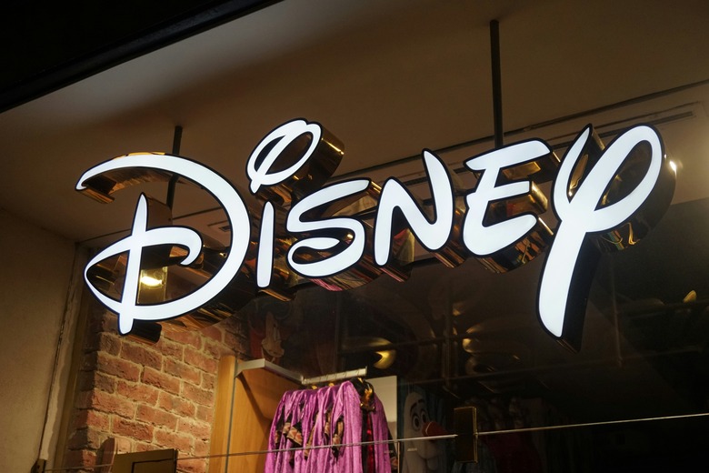A Disney sign at the entrance to a Disney store.