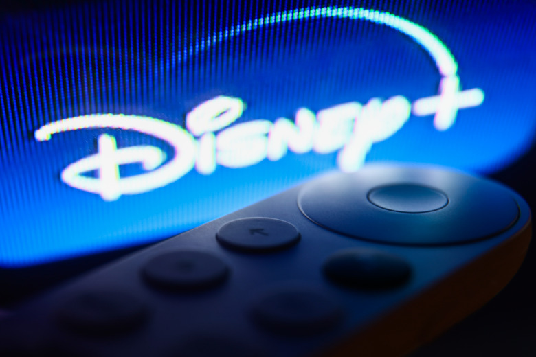 Disney+ logo on Chromecast menu displayed on a TV screen and Chromecast remote control are seen in this illustration photo taken in Krakow, Poland on July 19, 2023. (Photo by Jakub Porzycki/NurPhoto via Getty Images)