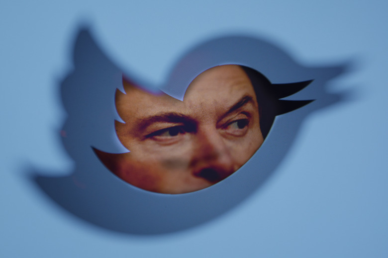 Twitter owner Elon Musk is seen with a Twitter logo in this photo illustration in Warsaw, Poland on 21 September, 2022. Twitter management has announced the introduction of a new verification label to replace the blue check previously given only to verified accounts. As the director of the service, Esther Crawford explains, unlike the blue symbol this one will be gray and it will be free. Twitter management has announced the introduction of a new verification label to replace the blue check previously given only to verified accounts. As the director of the service, Esther Crawford explains, unlike the blue symbol this one will be gray and it will be free. Verified accounts will now have an 'Official' badge under their username, along with a gray verification tag. All previously verified accounts will receive the 'official' check mark which will not be available for purchase and not everyone will be eligible. (Photo by STR/NurPhoto via Getty Images)