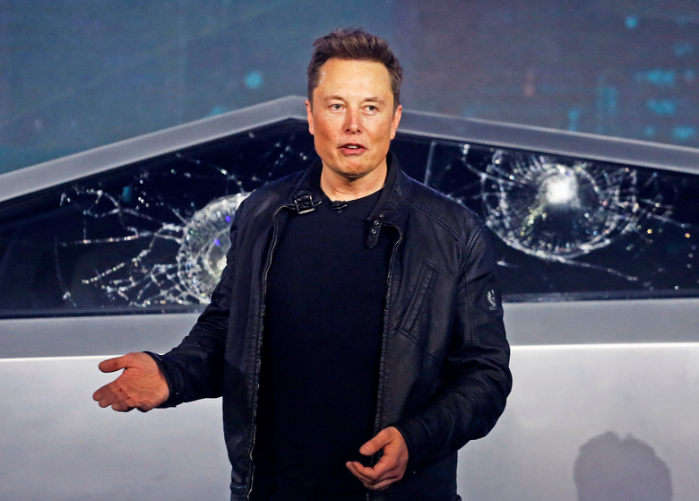 FILE - Tesla CEO Elon Musk introduces the Cybertruck at Tesla's design studio in Hawthorne, Calif., on Nov. 21, 2019. Many people are puzzled on what a Elon Musk takeover of Twitter would mean for the company and even whether he’ll go through with the deal. If the 50-year-old Musk’s gambit has made anything clear it’s that he thrives on contradiction.