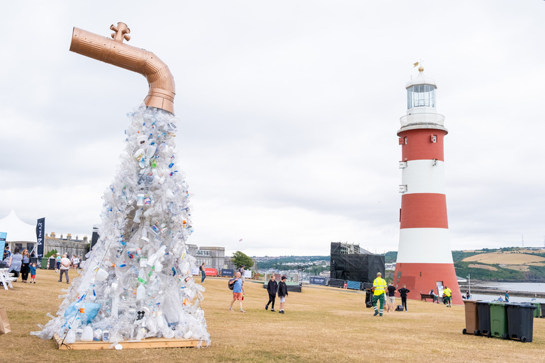 Giant Plastic Tap by artist and activist Benjamin Von Wong which is a giant tap sculpture spewing out single-use plastic waste to raise awareness of the root cause of the plastic problem: Plastic production, during the Great Britain Sail Grand Prix in Plymouth. Picture date: Saturday July 30, 2022. (Photo by Matt Keeble/PA Images via Getty Images)