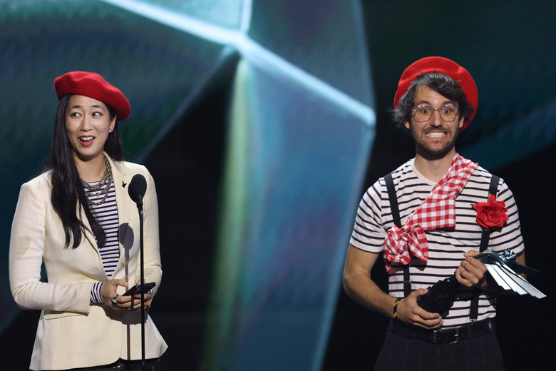 Jennifer Svedberg-Yen and Guillaume Broche of Sandfall Interactive on stage at The Game Awards 2025