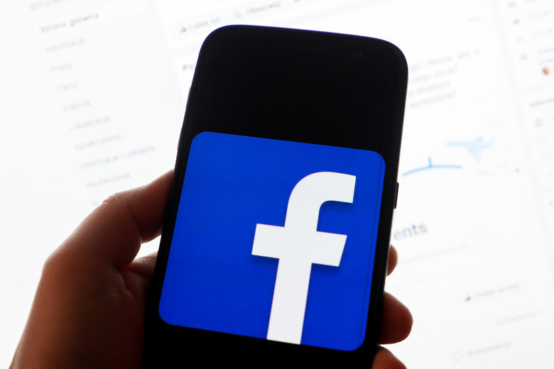 Facebook logo is displayed on a mobile phone screen photographed for illustration photo in Krakow, Poland on 29 January, 2019.  (Photo by Beata Zawrzel/NurPhoto via Getty Images)