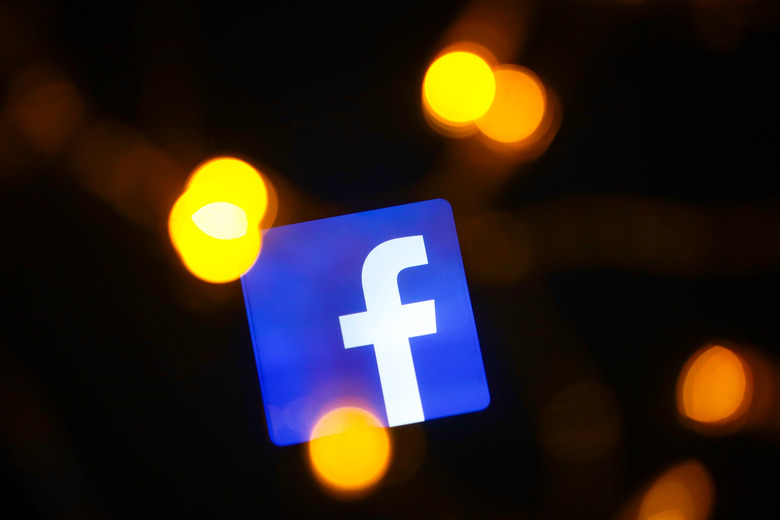 Facebook logo is displayed on a mobile phone screen photographed for illustration photo in Krakow, Poland on 16 January, 2020.  (Photo by Beata Zawrzel/NurPhoto via Getty Images)