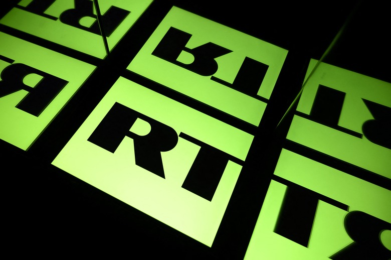 A picture taken on October 5, 2021 in Toulouse shows the logo of RT (Russia Today) TV channel displayed by a tablet. (Photo by Lionel BONAVENTURE / AFP) (Photo by LIONEL BONAVENTURE/AFP via Getty Images)