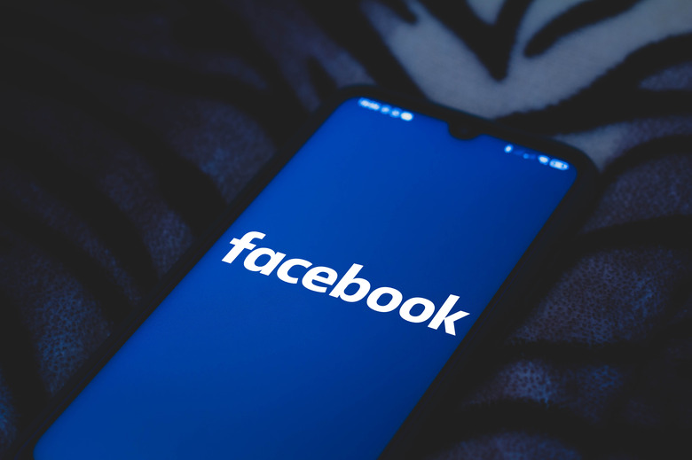 BRAZIL - 2021/03/30: In this photo illustration Facebook logo seen displayed on a smartphone. (Photo Illustration by Rafael Henrique/SOPA Images/LightRocket via Getty Images)