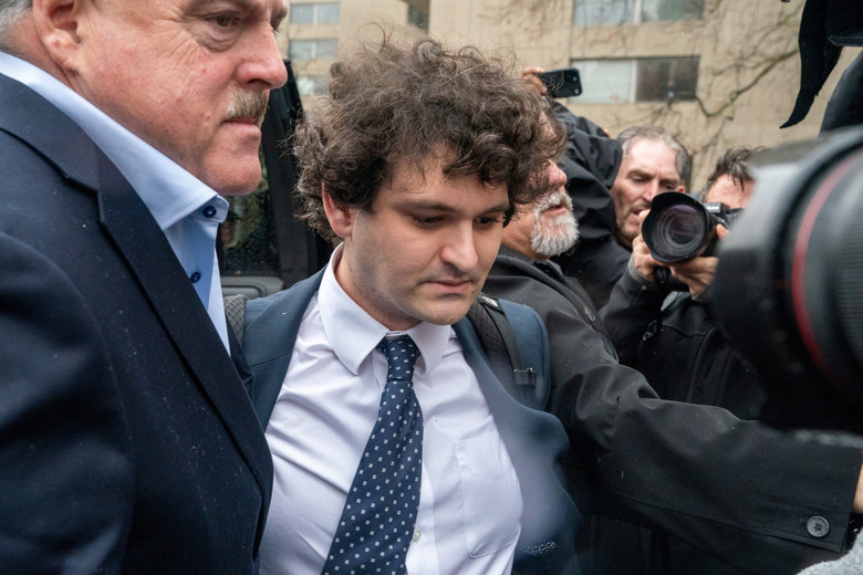 Former FTX Chief Executive Sam Bankman-Fried, who faces fraud charges over the collapse of the bankrupt cryptocurrency exchange, arrives on the day of a hearing at Manhattan federal court in New York City, U.S. January 3, 2023. REUTERS/David Dee Delgado
