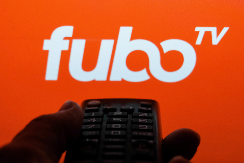 TV remote control is seen with fuboTV logo displayed on a screen in this illustration photo taken in Krakow, Poland on February 6, 2022. (Photo by Jakub Porzycki/NurPhoto via Getty Images)