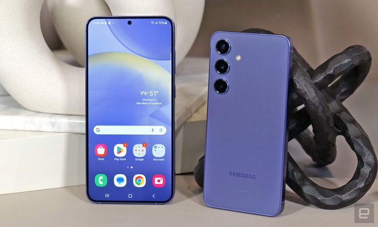 Two Galaxy S24s, one with its screen facing out and one with its rear facing out. Both are purple.