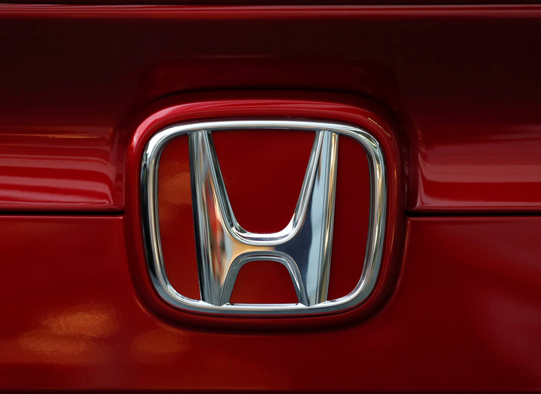 Honda Motor's logo is seen on Civic sedan car at its showroom in Tokyo, Japan October 4, 2017. REUTERS/Kim Kyung-Hoon
